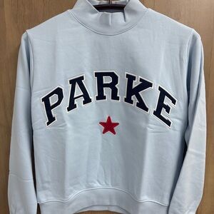 Parke Women's Light Blue Mock Neck Sweatshirt with Navy Appliqué and Red Star